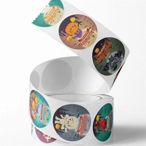 Roll of cartoon Halloween stickers featuring pumpkins, bats and mummies for gift decor