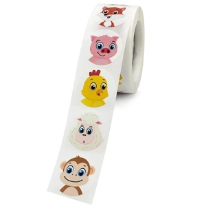 Close-up of animal cartoon stickers roll with fox, pig, and sheep for kids rewards