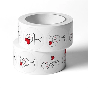 Close-up of two sticker rolls with cute black line stick figures and red hearts