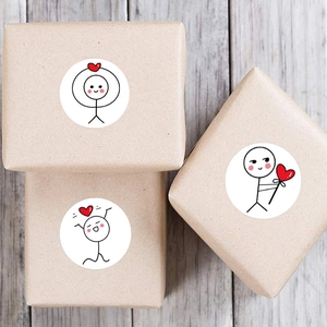 Cute round stickman stickers with red hearts on kraft gift boxes for packaging