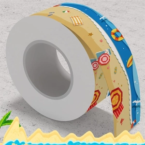 Detailed macro view of continuous summer beach theme patterned border stickers on a roll