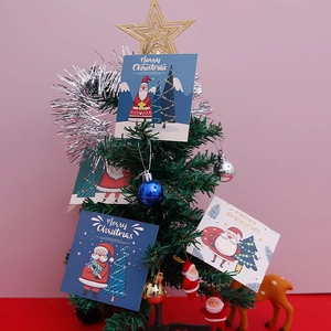 Lot de cartes de vœux de Noël avec illustrations du Père Noël sur un arbre festif