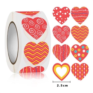 Detail of 2.5cm heart-shaped stickers with various artistic patterns on a roll