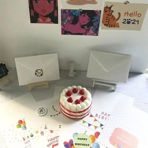 Detail of Happy Birthday cards with balloon patterns and envelope with Thank You sticker