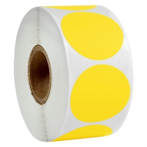Close-up of bright yellow round adhesive label roll for stationery coding use