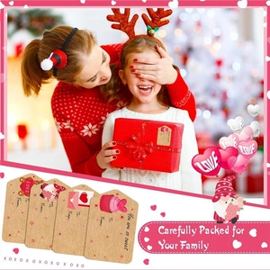 Roll of 500 heart stickers for Valentine gift wrapping with festive holiday patterns