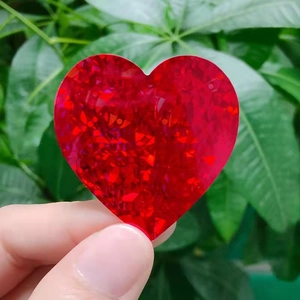 Sparkling red laser heart-shaped stickers for Valentine's Day gift labels and decoration