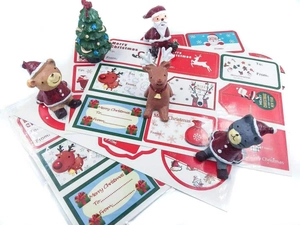Cartoon Christmas stickers set with Santa Claus and Reindeer for DIY gift packaging decoration