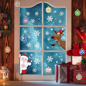 Christmas window decals with Santa, reindeer and snowflakes for festive home decoration