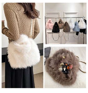 Detail view of the plush faux fur texture and spacious interior of this winter shoulder bag