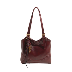 Retro burgundy oil wax leather tote bag with gold abacus charm and tassel decoration