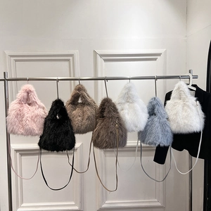 Faux fox fur plush crossbody handbag set in multiple colors with sleek leather straps