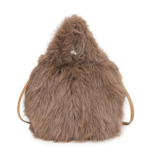 Brown faux fur bucket bag with plush handle and crossbody strap for autumn winter style