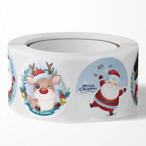Rouleau d'étiquettes cadeaux de Noël avec motifs de Père Noël et de renne mignon