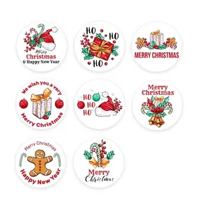 Roll of 500 Merry Christmas stickers with Santa and Gingerbread Man patterns, 2.5cm round labels
