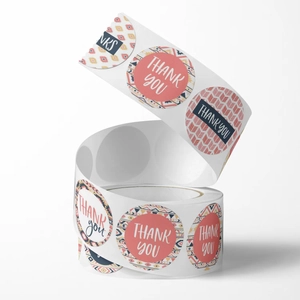 Rolle mit böhmischen runden Dankeschön-Aufklebern mit Blumenmustern und geometrischer Textur