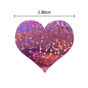 Pink holographic heart sticker with geometric laser patterns and 3.80cm width dimension