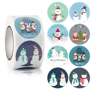 Detail of eight diverse Merry Christmas round sticker rolls with festive holiday patterns