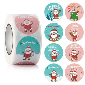 Detail view of 8 different cartoon Christmas seal stickers on a round adhesive roll
