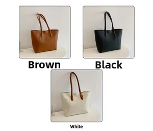 Detaillierter Vergleich der großen Shopper-Taschen in Braun, Schwarz und Weiß aus Kunstleder