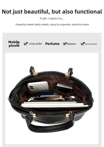 Top view of black tote bag interior showing large capacity and organized compartments