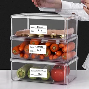 Three-layer clear stackable food storage containers with labels for organization