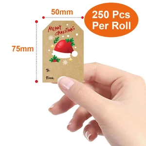 Brown kraft Christmas gift tags roll featuring Merry Christmas text and To-From labels