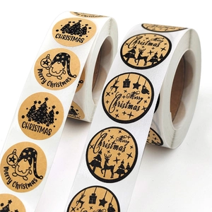 Two rolls of kraft Christmas stickers with reindeer and tree patterns for gift sealing