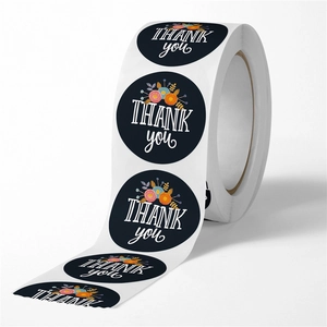 Roll of black floral Thank You stickers for gift packaging and wedding decoration