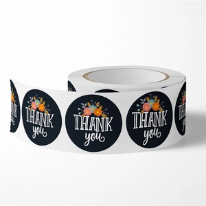 Roll of black floral Thank You stickers for gift wrapping and decorative sealing