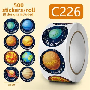 Close-up of solar system planet stickers with motivational quotes on 2.5cm round labels