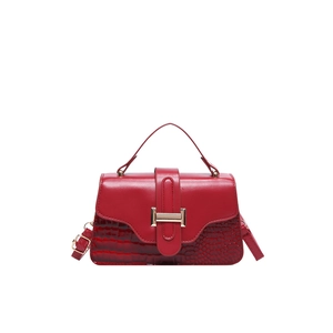 Chic red faux crocodile skin crossbody bag with gold buckle and adjustable strap