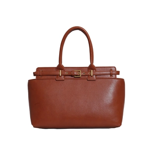Brown leather tote bag with belt buckle detail and gold hardware for office fashion