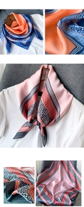 Détail d'un foulard en soie à imprimé géométrique aux tons orange et rose élégants