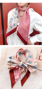 Detail of pink silk scarf with floral patterns and luxury double-G inspired motifs