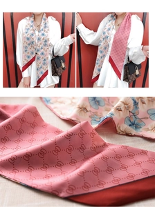 Detail of double-sided skinny silk scarf with floral and geometric chain patterns