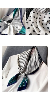 Vue détaillée d'une écharpe en soie avec motifs géométriques et texture satinée
