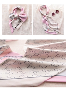 Close-up of lightweight twill silk scarf featuring elegant chain patterns and link prints