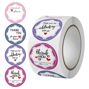 Macro shot of assorted floral Thank You stickers in a roll for gift box sealing