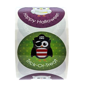Roll of cartoon owl Halloween stickers with Happy Halloween and Trick-or-Treat patterns