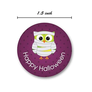 1.5 inch Happy Halloween sticker with a cute mummy owl design on purple background