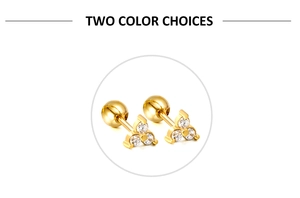 Detailed macro view of a gold triangle stud earring featuring three white zircons