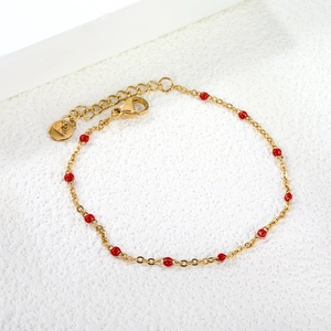 Adjustable gold stainless steel chain bracelet with small red beads and lobster clasp