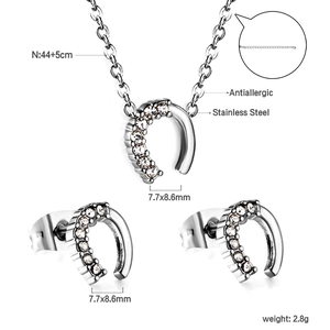 Set collana e orecchini a forma di U in acciaio inossidabile con zirconi bianchi