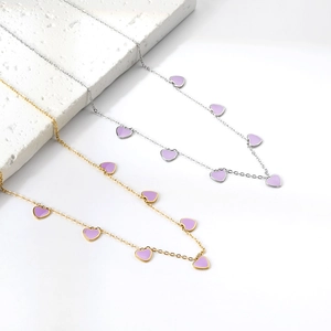 Minimalist stainless steel necklaces with purple enamel heart pendants in gold and silver