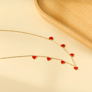 Golden chain necklace with seven red heart pendants in 18K plated stainless steel