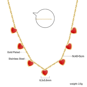 Detailed view of red heart pendant necklace with measurements and stainless steel specs