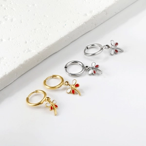 Charming dragonfly hoop earrings in gold and silver finish with red white enamel wings
