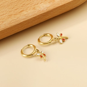 Elegant gold dragonfly hoop earrings with red and white enamel wings for women