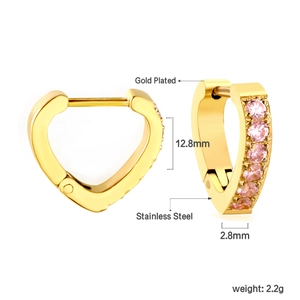 Detail of gold plated heart hoop earrings with pink zircons and stainless steel posts
